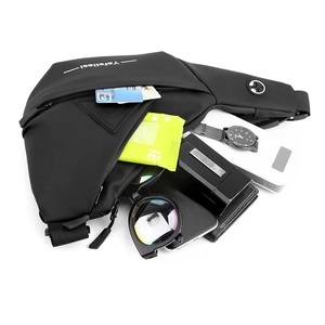 Top view of black waterproof chest bag showing spacious multi-compartment storage space