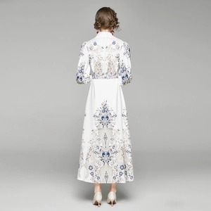 Robe longue vintage à imprimé paisley avec manches bouffantes et ceinture assortie