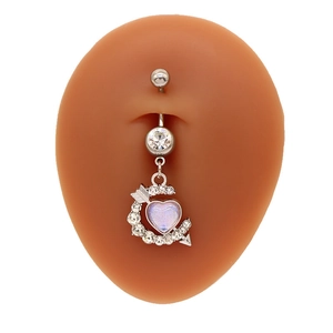 Detail of silver heart moon belly ring with purple gems on navel model