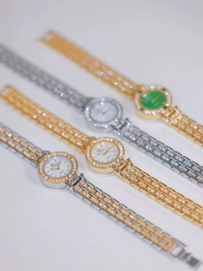 Detailed display of luxury quartz watches with diamond accents in gold and silver finishes