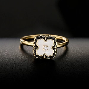 18K gold plated spinning floral ring with black and white enamel and zircon stone