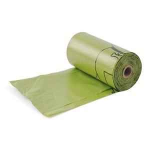 Detail view of grass green biodegradable pet waste bag roll with black dog line art pattern