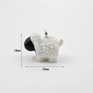 Detail view of a 3D cartoon sheep acrylic pendant with dimensions 18mm by 20mm