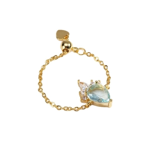 18K gold plated chain ring with pear-shaped blue stone and adjustable heart charm