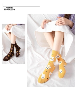 Detail of cotton crew socks featuring cute cartoon bear and bunny patterns on feet