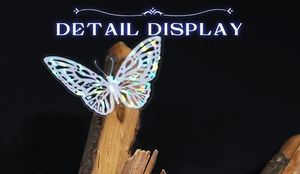 Macro detail of laser butterfly stickers with hollow design on rustic wood branch