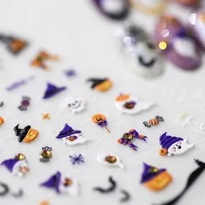 Halloween 3D nail stickers featuring embossed pumpkin, ghost, and bat patterns with rhinestones