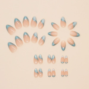 Set di 24 unghie finte a mandorla French con glitter blu e eleganti motivi a onde