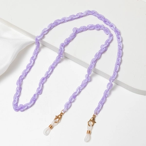 Detail of purple acrylic chain with marble texture and gold lobster clasps