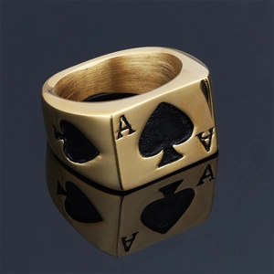 Detailed view of Ace of Spades ring with golden finish and black oil drop design