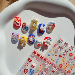 Detailed macro of 3D embossed nail stickers with cute rabbit and character designs