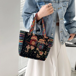 Ethnic embroidered canvas tote bag with owl pattern and colorful woven handle for women