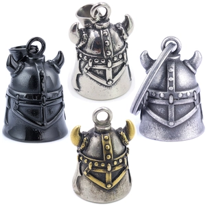 Detailed view of Viking helmet bells in silver, black, and gold finishes with horn details