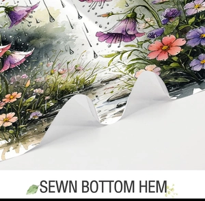 Detailed close-up showing the high-quality sewn bottom hem on a floral fabric shower curtain
