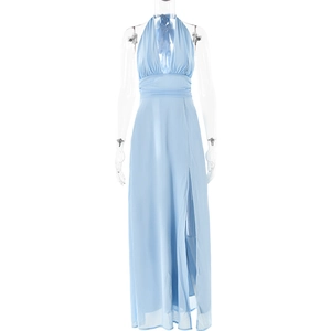 Detail view of light blue halter neck maxi dress with high slit and flowing chiffon fabric