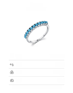 Macro detail of S925 sterling silver band featuring eleven inlaid turquoise round beads
