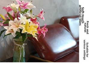 Close-up of lifelike 3D soft glue lily flowers in a glass vase on a side table