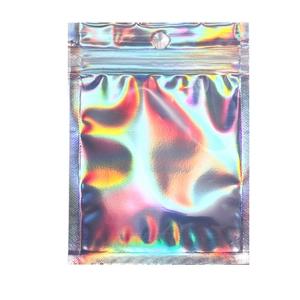Macro shot of iridescent holographic resealable pouch with hanging hole and metallic finish