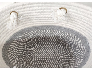 Detailed close-up of the two-tone woven cotton rope tote bag in white and grey