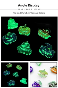 Glow-in-the-dark Halloween hair claw clips with pumpkin and ghost designs in the dark