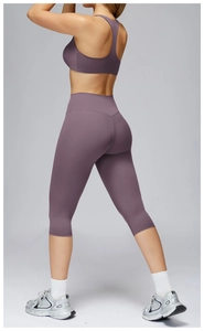 Detail of Morandi purple yoga set featuring high-stretch racerback bra and fitted leggings