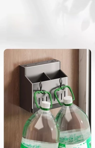 Detail of wall-mounted kitchen organizer showing strong weight capacity with two water jugs
