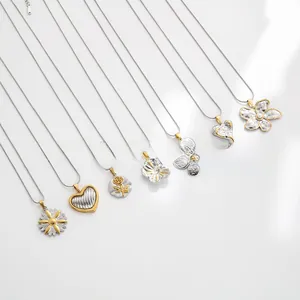 Detailed arrangement of multiple floral stainless steel necklaces with golden highlights