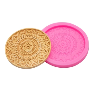 Pink silicone mold for round floral coasters and plaster crafts with mandala patterns