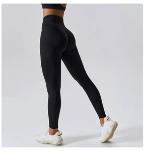 Detailed back view of high-waisted black yoga pants showing contouring fit and fabric texture