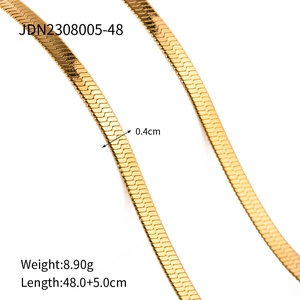 Close-up of golden flat snake bone chain with polished texture and size specifications