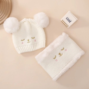Winter baby knitted hat and scarf set with white faux fur pom-poms and bear face embroidery