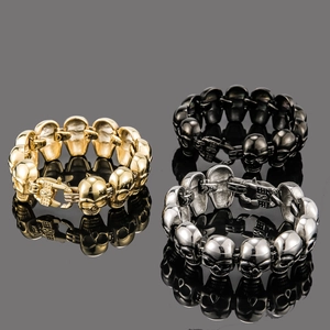 Gothic skull link bracelets for men in gold, black, and silver stainless steel set
