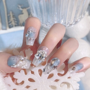 Blue gradient snowflake press-on nails with rhinestones and pearls in trapezoid shape