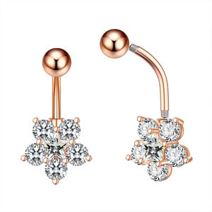 Detail of rose gold navel ring with zircon flower and screw thread interface view