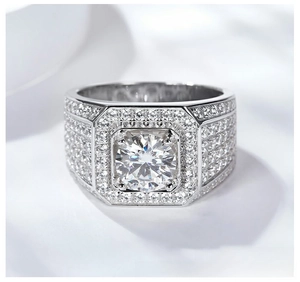 Macro detail of luxury men's silver ring with a large 5-carat round brilliant moissanite stone