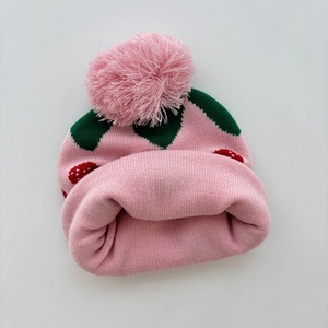 Pink strawberry jacquard knit hat for girls with fluffy pompom and leaf texture
