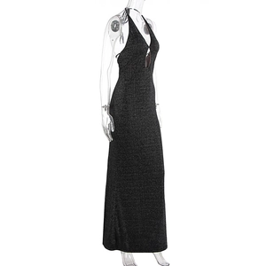 Detail of a black sequined halter evening dress with a front cutout and open back