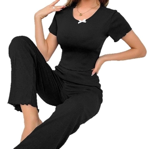 Women's black ribbed short sleeve pajamas set with bow detail and long pants