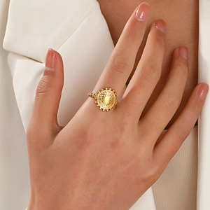 18K gold plated stainless steel coin ring featuring a sunburst medal and twisted band