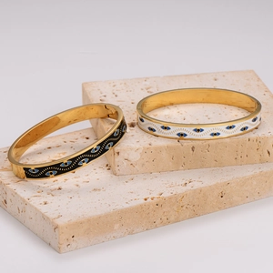 Vintage evil eye bangles with black and white enamel on gold stainless steel base