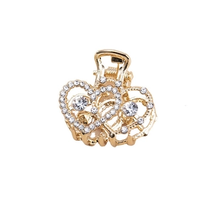 Mini pince à cheveux élégante en métal doré avec strass brillants au design double cœur