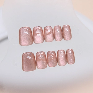 Short square cat eye press-on nails with rose pink heart-shaped magnetic light effect