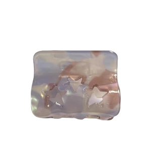 Pink and blue gradient star hair claw clip with holographic resin and hollow stars