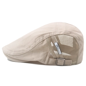 Side view of beige mesh newsboy hat with breathable panels and metal buckle strap
