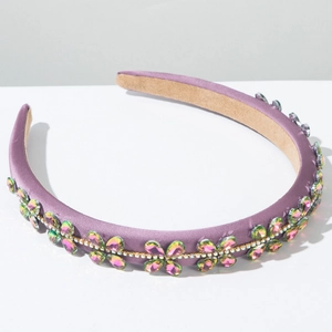 Detail of purple satin headband with gradient crystal flower clusters and velvet lining