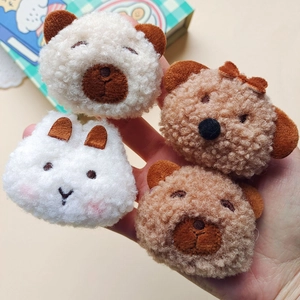 Plush bear and rabbit animal head accessories in soft beige and brown for DIY crafts