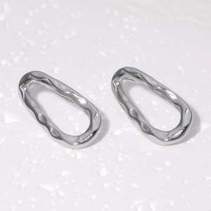 Sleek silver stainless steel stud earrings with irregular oval ripple texture design