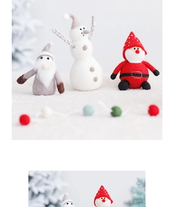 Close-up of wool felt Santa Claus and Snowman ornaments for Nordic Christmas table decor