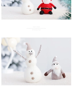 Detail of wool felt Christmas snowman and Santa ornaments in festive red and white colors