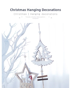 Close-up of laser-cut wooden Christmas ornaments with reindeer and cedar patterns